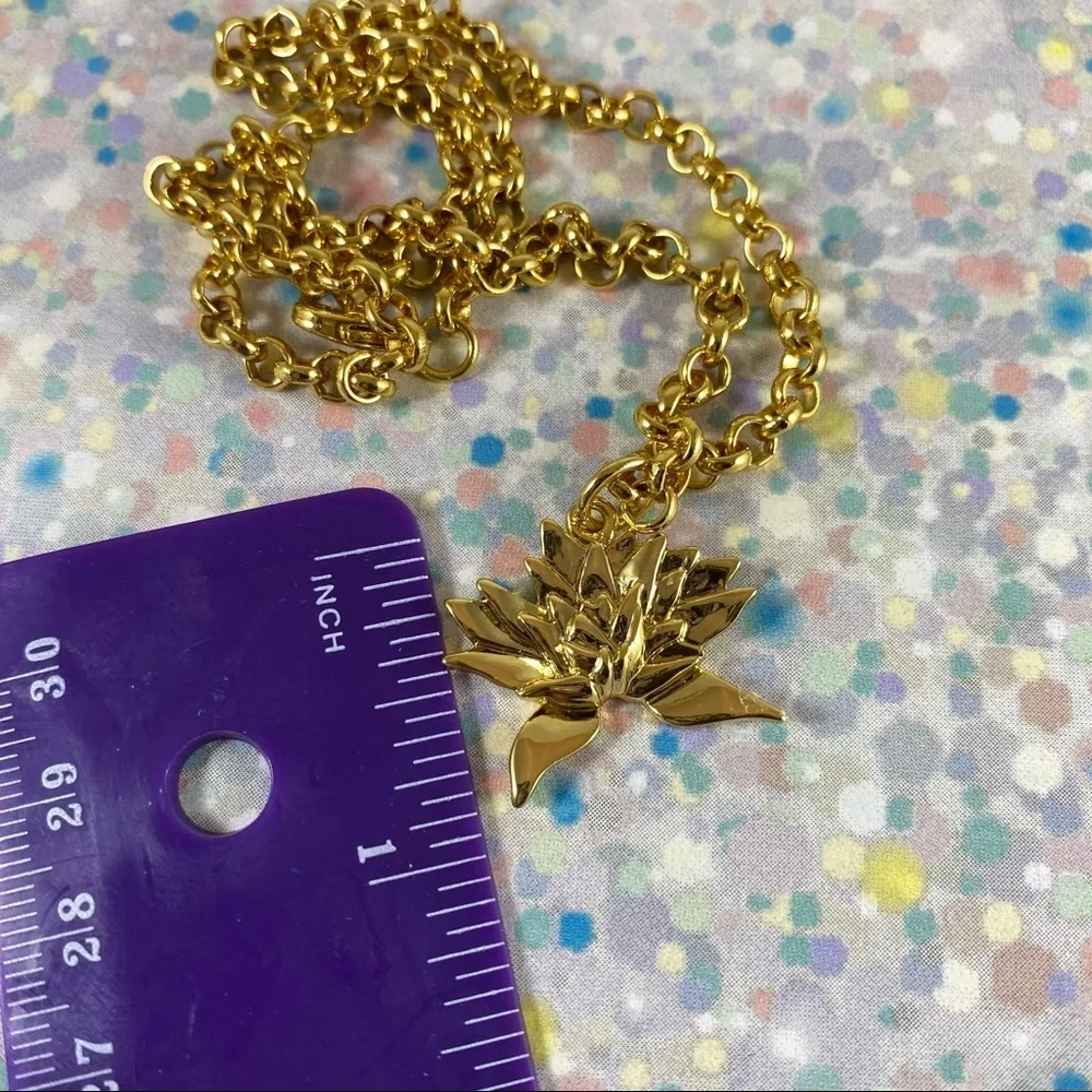 Lovely little gold-tone Lotus necklace